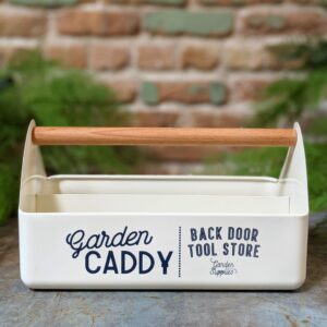 White garden storage caddy with a wooden handle and garden caddy written in blue script